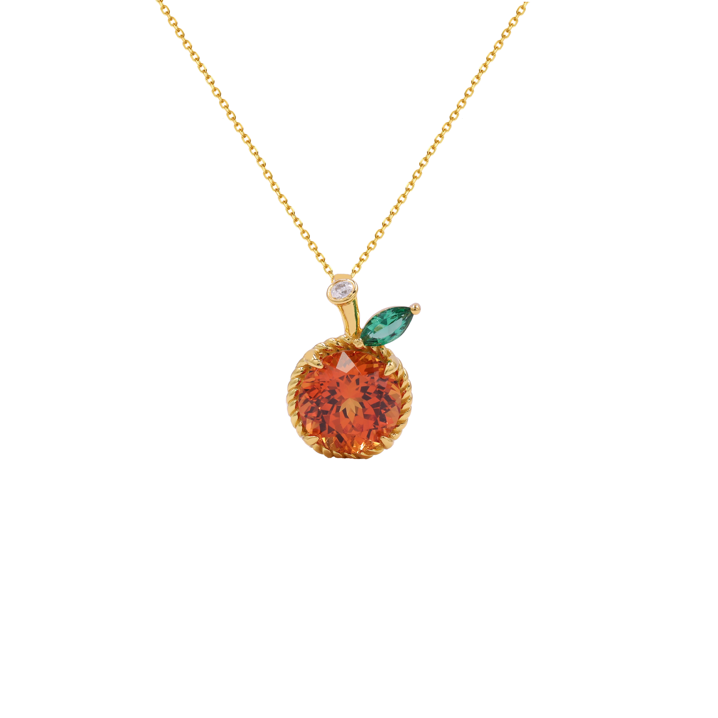 A gold necklace with an orange-shaped pendant featuring a faceted orange-red center, a small green marquise gemstone leaf, and a tiny clear accent stone on a white background.